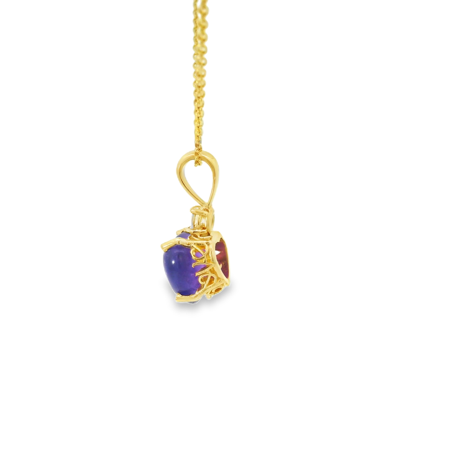 Gold necklace with a pendant featuring purple and red stones on a white background
