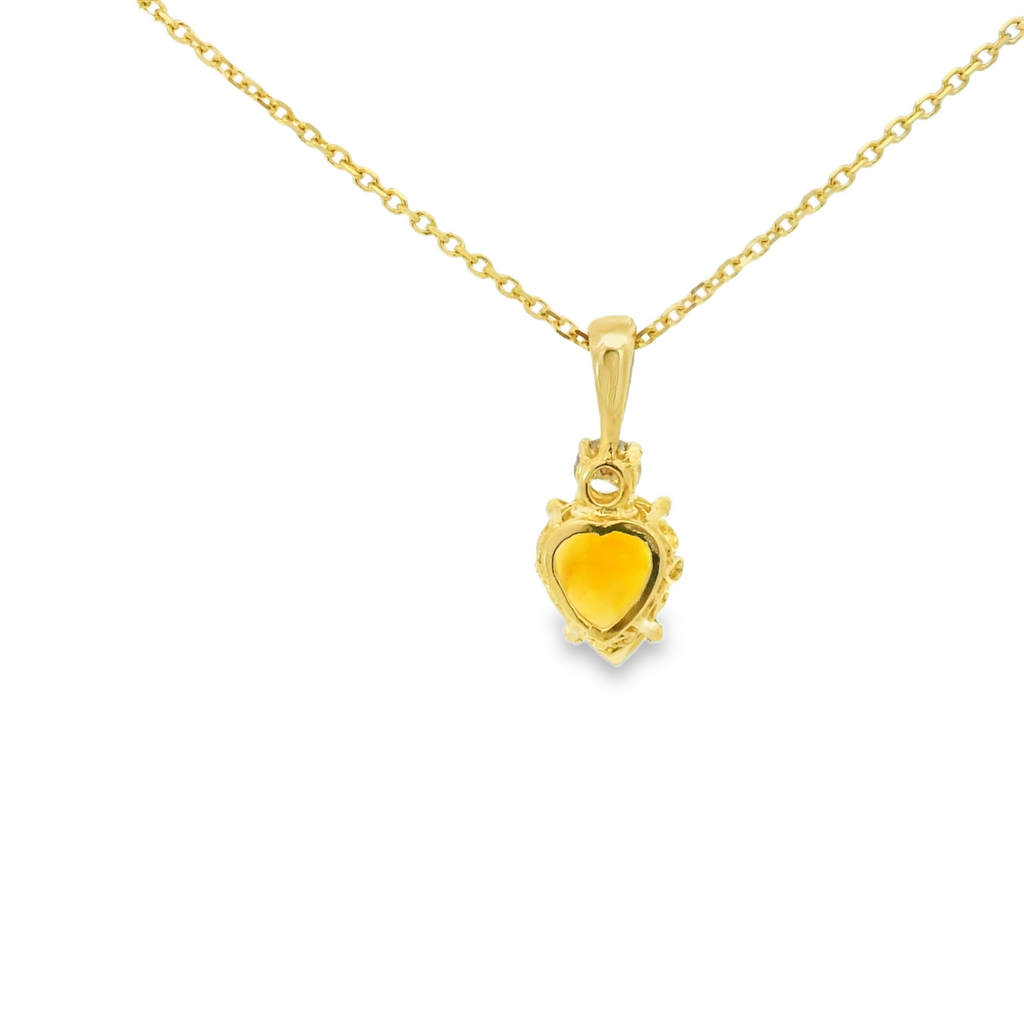 Gold necklace with a opal gemstone pendant and diamond on a white background