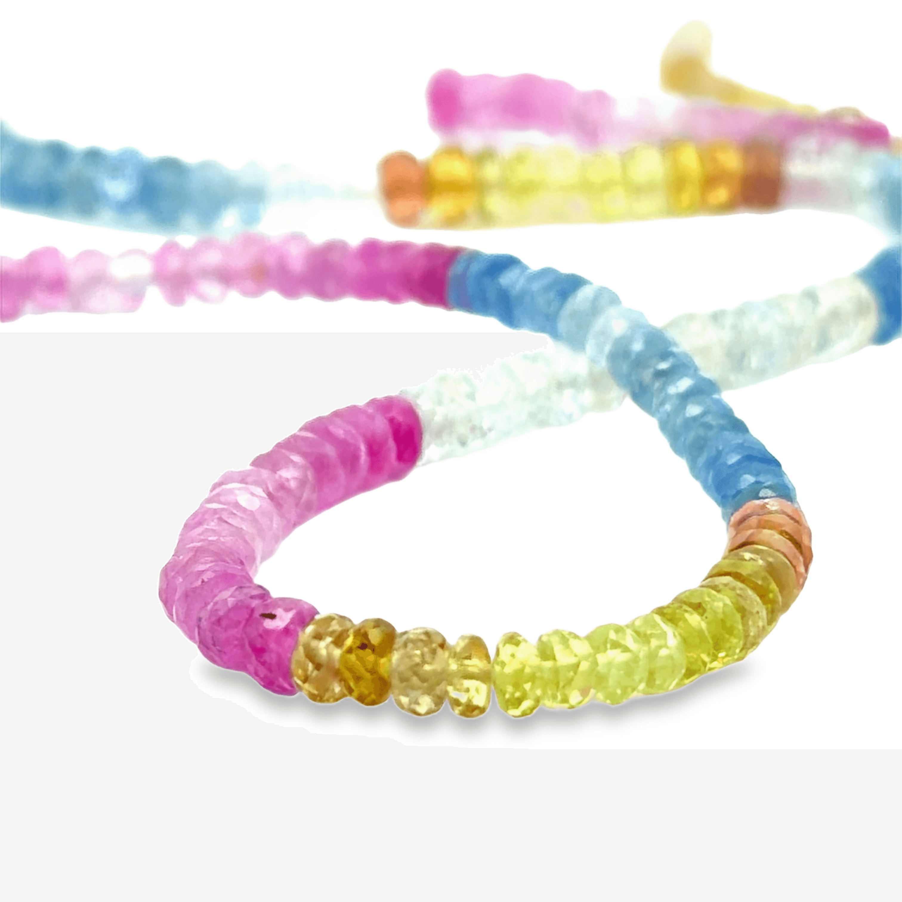 Colorful beaded sapphire necklace on a white background