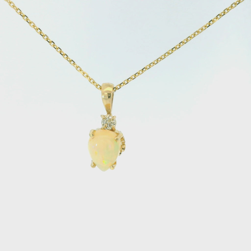 Opal and diamond pendant