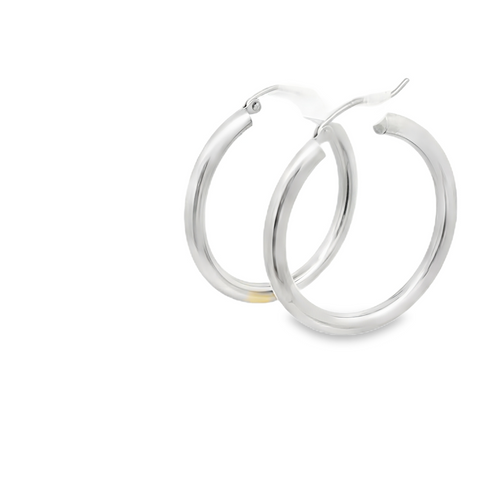 White gold hoop earrings on a white background